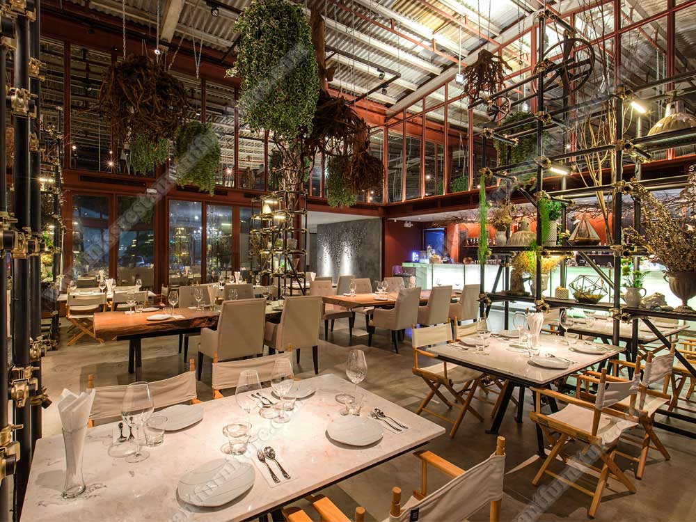 Tailand Bangkok Vivarium restaurant furniture_marble restaurant table and folded fabric arm dining chairs